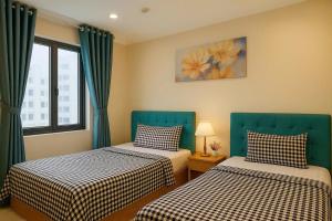 En eller flere senge i et værelse på Phan Anh Hotel - Bui Vien Walking Street