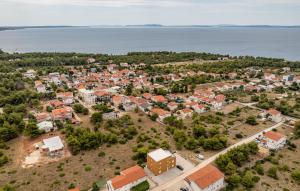 an aerial view of a small town by the water at 2 Bedroom Gorgeous Apartment In Vir in Vir +17 photos