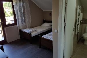 Postelja oz. postelje v sobi nastanitve Apartmani Simić Valjevo
