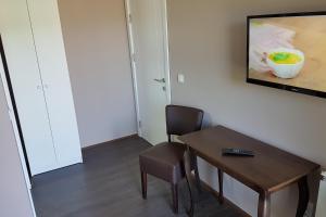 TV in/ali zabaviščno središče v nastanitvi Apartmani Simić Valjevo