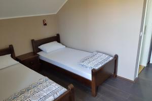 Postelja oz. postelje v sobi nastanitve Apartmani Simić Valjevo