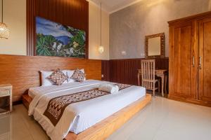 Ένα ή περισσότερα κρεβάτια σε δωμάτιο στο pakis romantic private room & swimming pool exclusive in ubud
