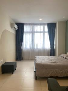 Ένα ή περισσότερα κρεβάτια σε δωμάτιο στο Riverine Resort Diamond, 05-A