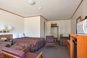 Postel nebo postele na pokoji v ubytování Budget Inn near WestRock