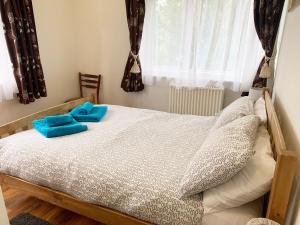 Postel nebo postele na pokoji v ubytování Brookside
