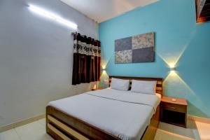 Katil atau katil-katil dalam bilik di Sampada Homestay