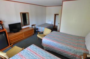 Postel nebo postele na pokoji v ubytování Budget Inn near WestRock