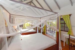 Katil atau katil-katil dalam bilik di Ti Kaye Resort & Spa