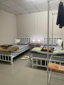 Postel nebo postele na pokoji v ubytování Sphinx room