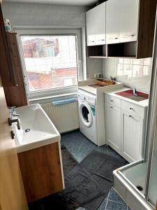 Kuchyň nebo kuchyňský kout v ubytování Elgi Apart