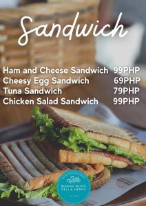 a sandwich cut in half on a plate at Cabin B in Bigang Munti in Batangas City +20 photos