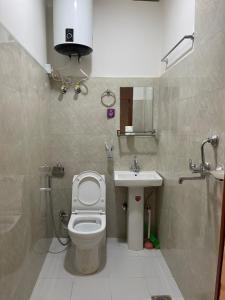 Vannituba majutusasutuses Hotel Jigmeling Triple Delux