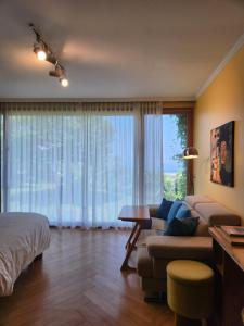Postel nebo postele na pokoji v ubytování JEJU Doldam B&B