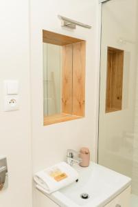 Ένα μπάνιο στο Krynica Apartamenty - Apartament typu studio Źródlana