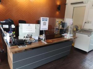 Fotografie z fotogalerie ubytování Capital O 75406 Hotel M Rojana v destinaci Ayutthaya