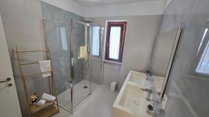 Koupelna v ubytování MaVa ROOMS