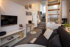 TV a/nebo společenská místnost v ubytování Rooms N&M