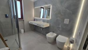 Koupelna v ubytování MaVa ROOMS