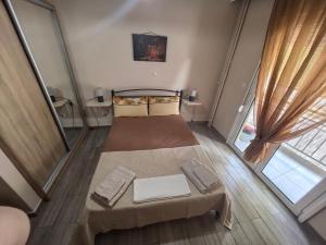 Ένα ή περισσότερα κρεβάτια σε δωμάτιο στο Artemis sweet apartment