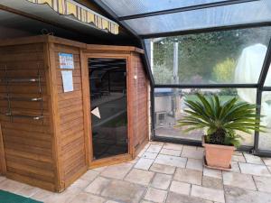 a building with a door and a potted plant at Gite oncle Yerry in Ostheim +42 photos