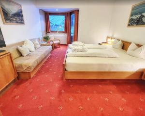 Postel nebo postele na pokoji v ubytování Alpine B&B