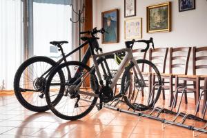 a bike parked on a stand in a room at Agriturismo Il Follo in Valdobbiadene