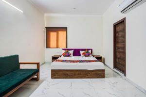 Ένα ή περισσότερα κρεβάτια σε δωμάτιο στο FabHotel The Glampoint