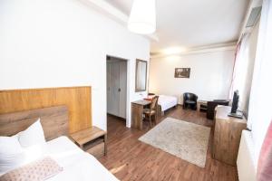 Posteľ alebo postele v izbe v ubytovaní Hotel Džbán