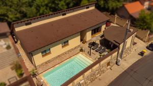 an overhead view of a house with a swimming pool at Casa Transilvania - Pool & Sauna in Mediaş