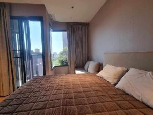 Katil atau katil-katil dalam bilik di Once Condo Pattaya +9 gambar