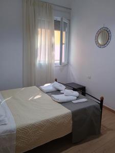 Postel nebo postele na pokoji v ubytování Kitro apartment
