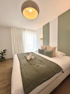 En eller flere senge i et værelse på Le Duplex Mitterrand, Centre de Saint Jacques