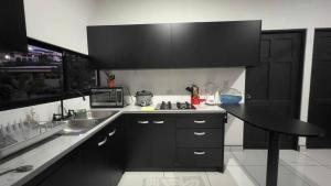 Photo de la galerie de l'établissement Cozy Apartment Rental, à Quepos 19 autres photos