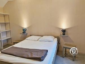 Ένα ή περισσότερα κρεβάτια σε δωμάτιο στο Chalet le Vairon (PMR)