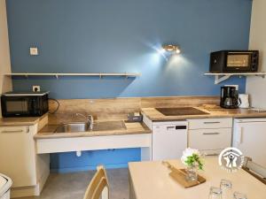 Køkken eller tekøkken på Chalet le Vairon (PMR) + 31 billeder