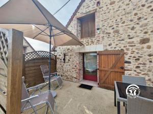 Patio nebo venkovní prostory v ubytování La Closerie de la Trottinière