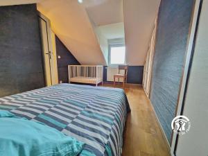 Ένα ή περισσότερα κρεβάτια σε δωμάτιο στο Le Rendez vous