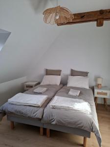 Postel nebo postele na pokoji v ubytování Chez Valentin, jusqu'à 9 personnes