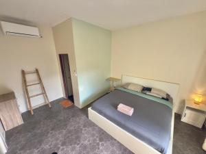Postel nebo postele na pokoji v ubytování Sleep Inn - Lonely Beach + 4 fotografie
