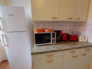 Kuchyň nebo kuchyňský kout v ubytování Le Presbytère + 20 fotografií