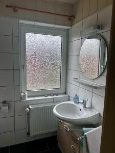 Ein Badezimmer in der Unterkunft Ferienhaus Müller