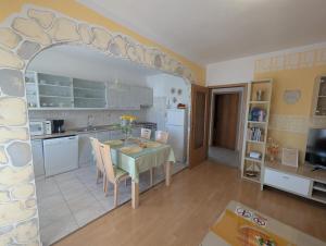 Kuchyň nebo kuchyňský kout v ubytování Apartment Sara