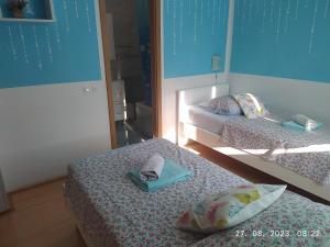 Postel nebo postele na pokoji v ubytování Apartment Sara