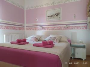 Postel nebo postele na pokoji v ubytování Apartment Sara