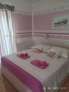 Postel nebo postele na pokoji v ubytování Apartment Sara