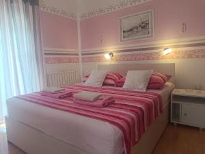 Postel nebo postele na pokoji v ubytování Apartment Sara