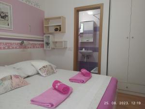 Postel nebo postele na pokoji v ubytování Apartment Sara