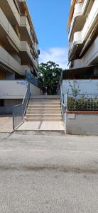 a set of stairs in front of a building at Appartamento Luigi in Alba Adriatica