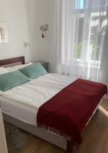 Postel nebo postele na pokoji v ubytování Kertész-ház