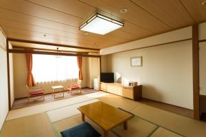 TV a/nebo společenská místnost v ubytování Washigatake Kogen Hotel Rainbow